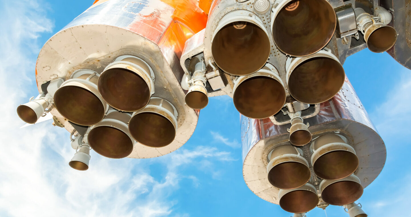 Space,Rocket,Engines,Of,The,Russian,Spacecraft,Over,Blue,Sky